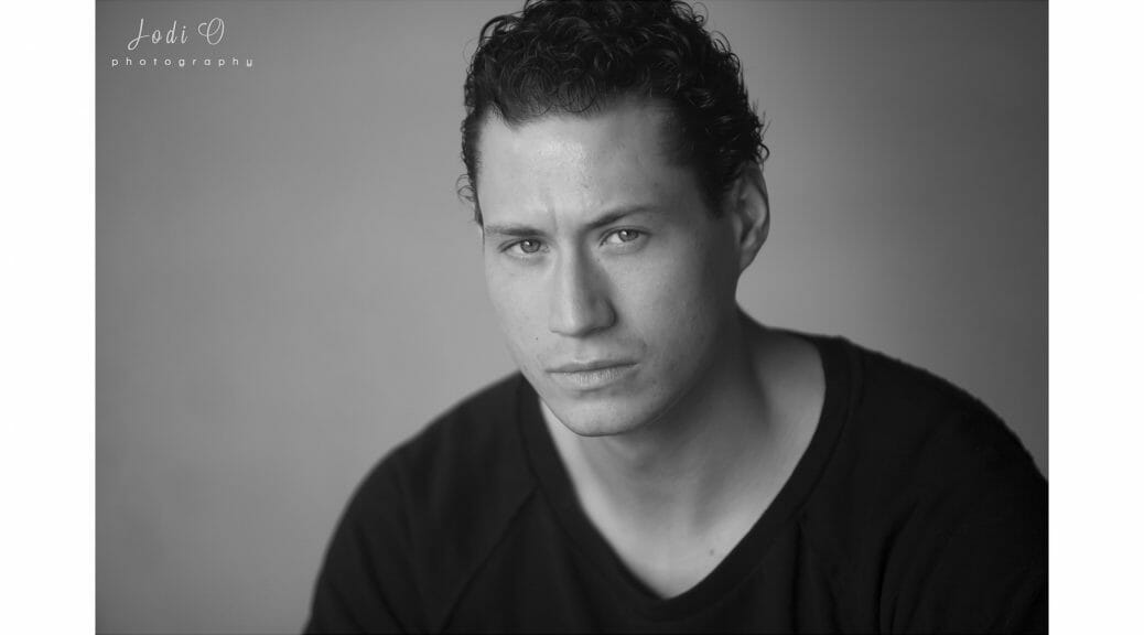 Calgary actor and model in black top in his photoshoot downtown