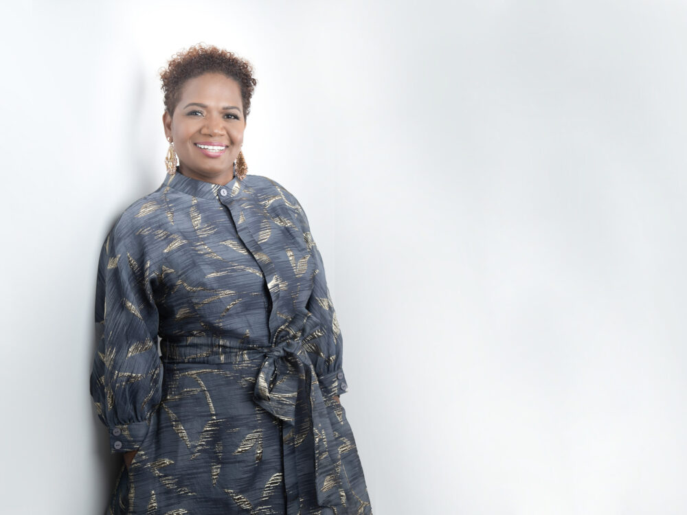 Gorgeous Nigerian clients showing off high fashion dress and accessories for her Calgary headshot session.