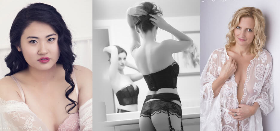Three women pose in lingerie during a boudoir session: one with dark hair looks at the camera, another adjusts her hair in front of a mirror, and the third, blonde, smiles while holding her lace robe slightly open. - Jodi O Photography
